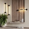 Миниатюра фото настенный светильник odeon light stich 6667/12wl черный | 220svet.ru